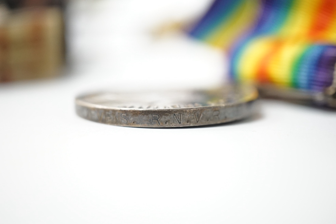 A First World War medal trio awarded to Lieut. W. Cleveland-Stevens. R.N.V.R., together with a miniature on ivory of a 19th century Captain with description to reverse, a signed military coloured engraving, a paper knife